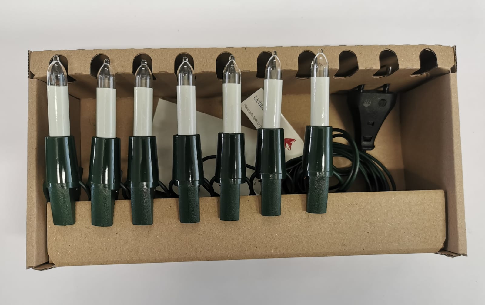 Schwibbogenkette 7 Minischaftkerzen, 12cm Kerzenabstand